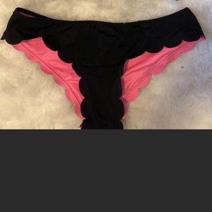 Victoria’s Secret black scalloped bikini bottoms.